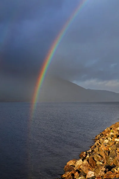 Rainbow over the sea Stock Image