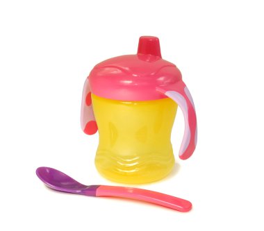kaşık ile sarı bebek şişe