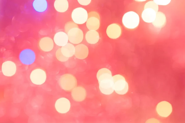 Schöne beruhigende Korallenfarbe Bokeh Hintergrund. Frohes neues Jahr und Weihnachten Hintergrund mit funkelnden Bokeh. — Stockfoto