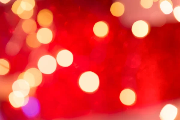 Güzel kırmızı renkli bokeh arkaplan. Mutlu yıllar ve Noel arkaplanı Işıl ışıl bokeh. — Stok fotoğraf