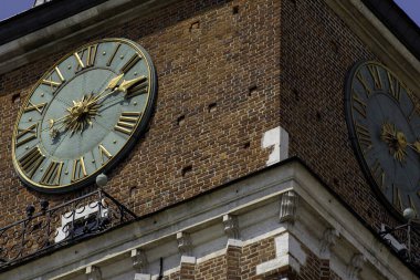 Close up Clock at the Wawel Cathedral at the Rynek, Old City Centre. Architecture of an Old European City.