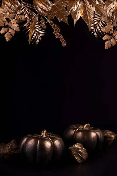 Gold and black luxury pumpkin. Minimalist banner good for Thanksgiving and Halloween.