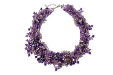 Very Peri Purple Lilac Luxurious Handmade necklace of small glass beads with natural stones on white. Fashionable stylish festive and casual Jewelry accessory decoration for women.