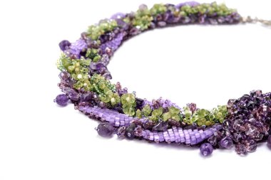 Very Peri Purple Lilac Green Luxurious Handmade necklace of small glass beads with natural stones on white. Fashionable stylish festive and casual Jewelry accessory decoration for women.