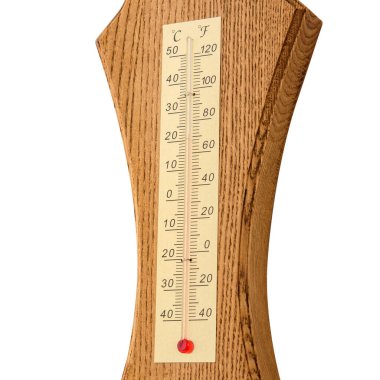 Old style thermometer on wood texture isolated on white background. Room temperature.