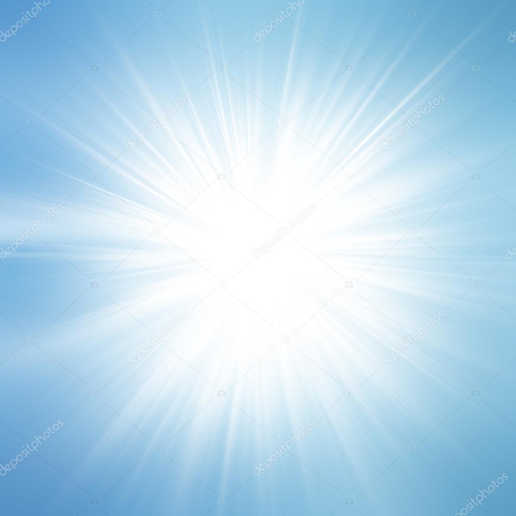 Sun on blue sky with lenses flare