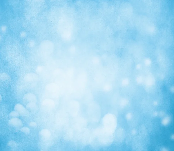 Bianco bokeh su grungy blu sfondo — Foto Stock