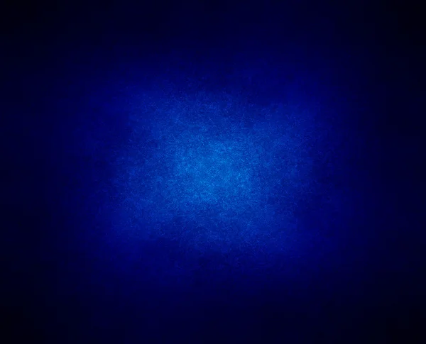 Fondo azul abstracto o papel oscuro con spotli centro brillante — Foto de Stock