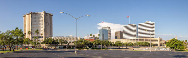 Corpus Christi, Texas, USA - September 18, 2021: The Nueces County Court thouse with the citys skyline on the background