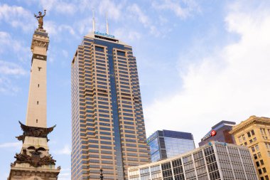 Indianapolis, Indiana, USA - October 19, 2021: The Indiana State Soldiers and Sailors Monument Next to the Salesforce Tower