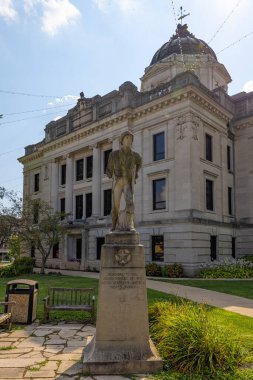 Bloomington, Indiana, USA - August 20, 2021: The Monroe County Courthouse and it is WWII Memorial