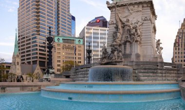Indianapolis, Indiana, USA - October 19, 2021: The Indiana State Soldiers and Sailors Monument and the Christ Church Cathedral