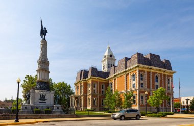Winchester, Indiana, USA - August 21, 2021: The  Randolph County Courthouse and it is civil war monument