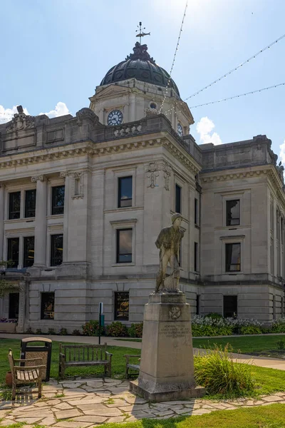 Bloomington, Indiana, USA - August 20, 2021: The Monroe County Courthouse and it is WWII Memorial