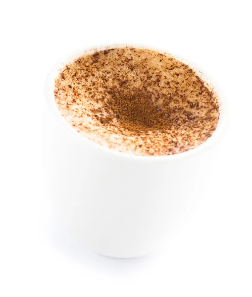 Coffee with milk powdered with chocolate in a cup on a white bac — Stock Photo, Image