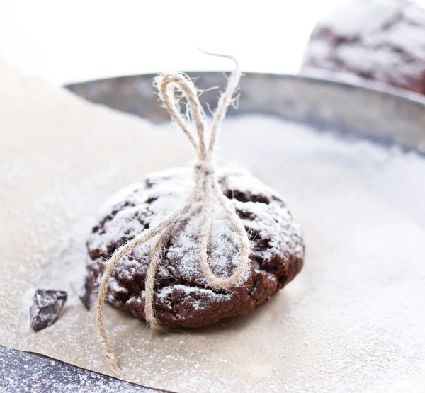 Fresh chocolate cookies on perchament background — Stock Photo, Image