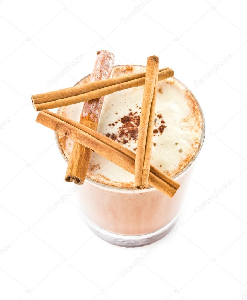 Iced blended frappe coffee with cinnamon isolated on white back
