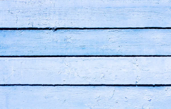 Tableros horizontales de madera azul viejo con los clavos oxidados martillados —  Fotos de Stock