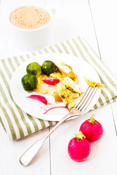 Healthy fresh Breakfast with fried cutted egg, brussels sprouts, radish and coffee with milk on white wooden background — Stock Photo, Image