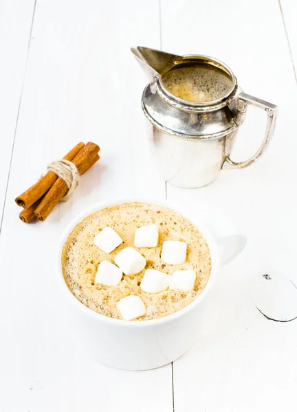 Cup of cappuccino with foam, marshmallow, cinnamon and milk mug — Stock Photo, Image