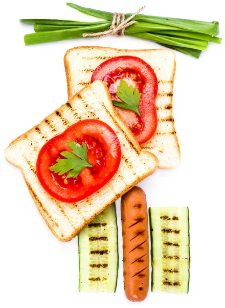 Breakfast set of toast bread, tomato, sausage and herbs — Stock Photo, Image