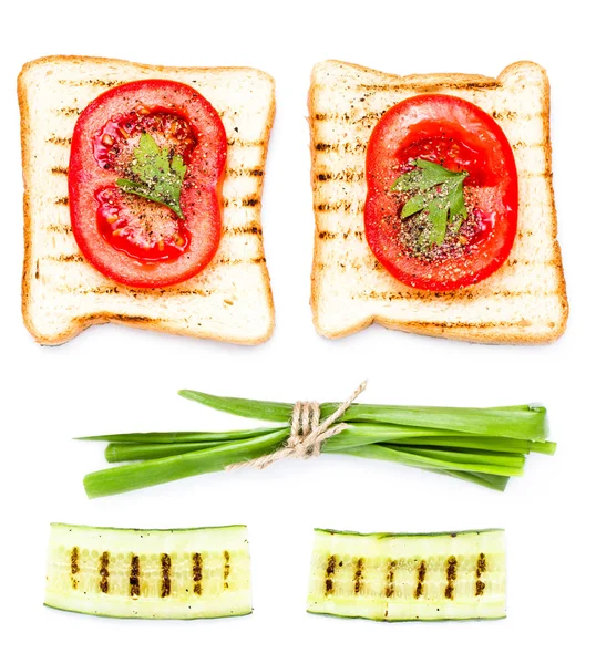 Ingredients for breakfast with bread, tomato, and vegetables — Stock Photo, Image