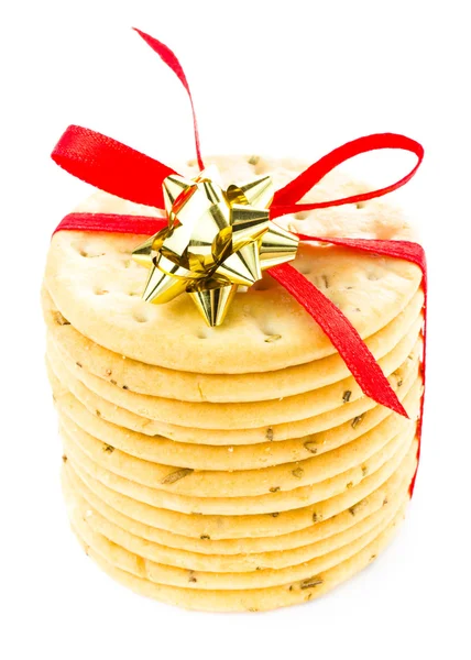 Kerstmis zandkoek verpakt met rood lint gebak cookies — Stockfoto
