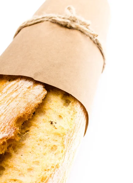 Francuska Bagietka chleb na białym tle, makro — Zdjęcie stockowe