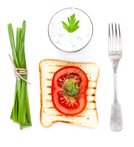 Toast bread, tomato and herbs, isolated on white background — Stock Photo, Image