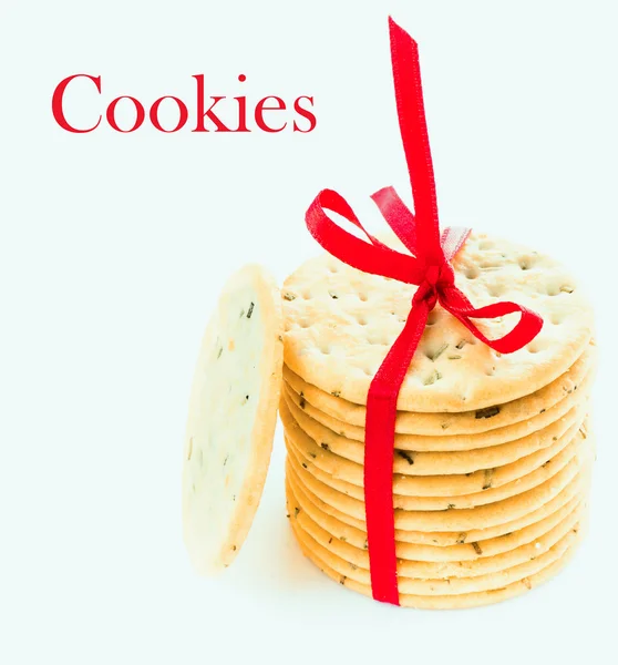 Sweet cookies tied with red ribbon isolated on white background. — Stock Photo, Image