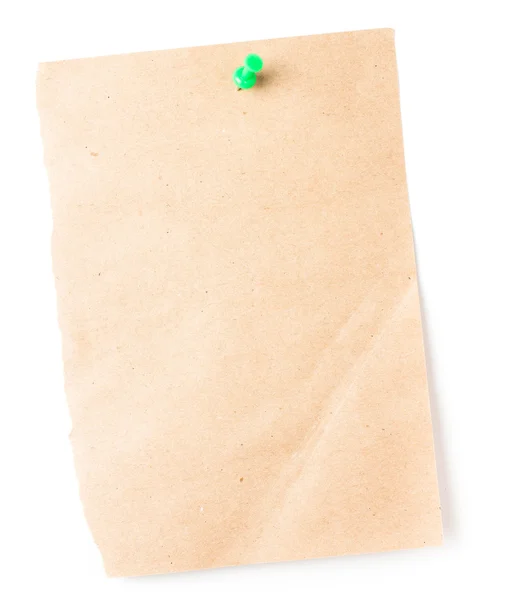 Ανακυκλωμένο χαρτί περιτυλίγματος ραβδί με πάτημα καρφίτσα σε άσπρο φόντο. — Φωτογραφία Αρχείου