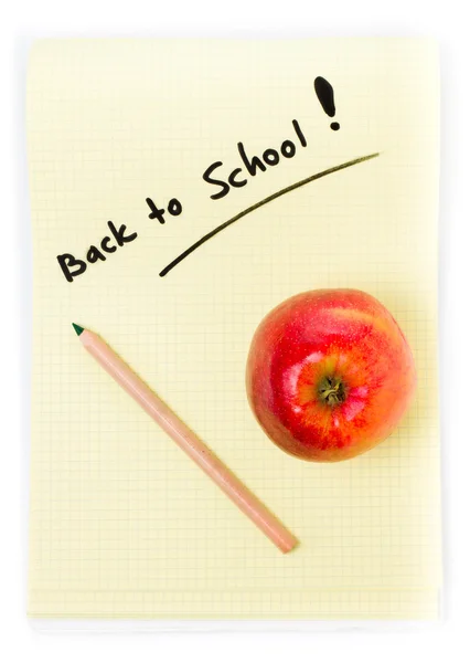 Squared paper yellow sheet and apple back to school on white background. — Stock Photo, Image