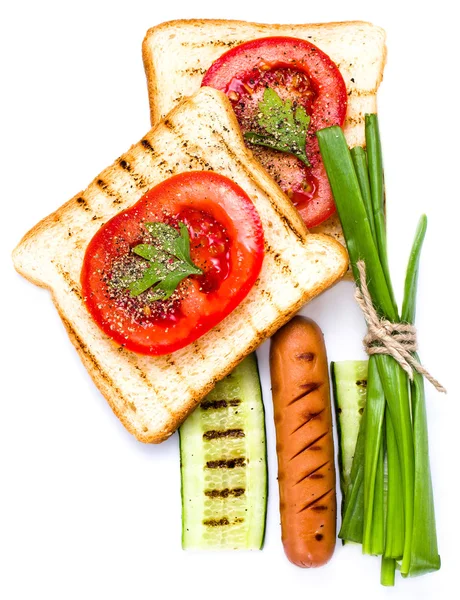 Breakfast set of toast bread, tomato, sausage and herbs — Stock Photo, Image