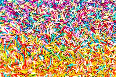Candy, tam kare planda sprinkles. renkli yüzlerce ve
