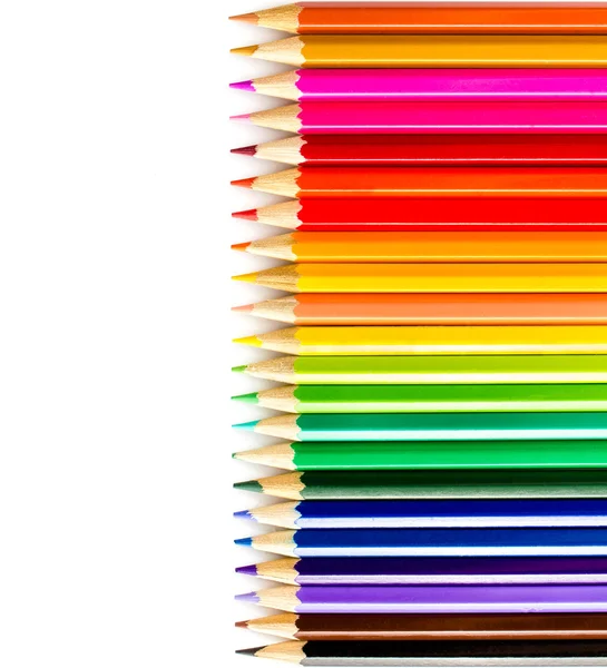 Colored pencils rainbow on white background close up — Stock Photo, Image