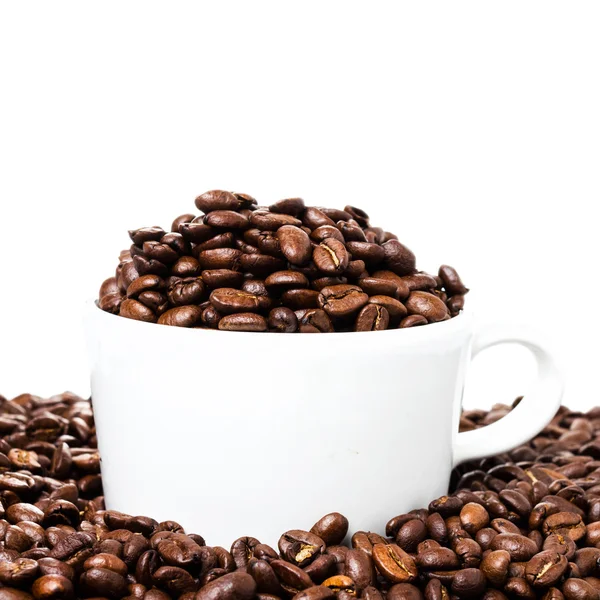 Tazza di caffè con fagioli primo piano . — Foto Stock