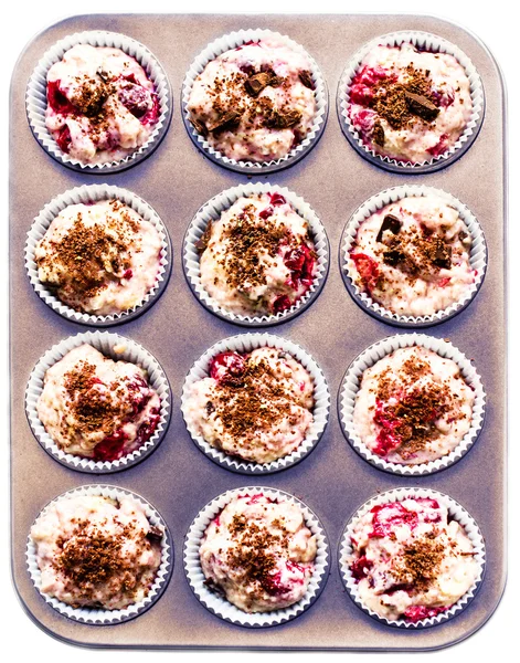 Overhead view of a baking tray with muffin batter — Stock Photo, Image