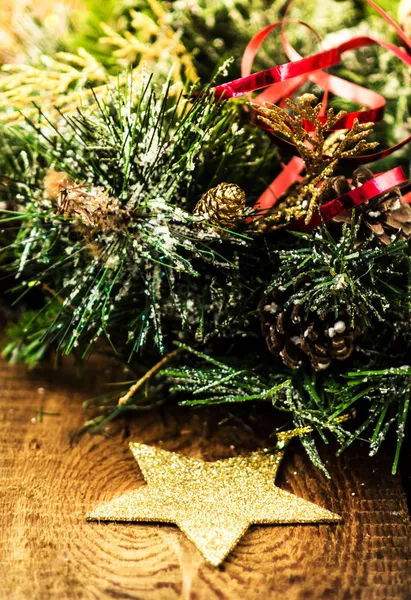 Christmas Bunch of Fir tree or pine branches and glowing star — Stock Photo, Image