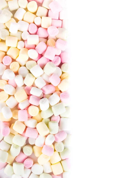 En hög med små färgade uppsvullna marshmallows kan använda som bakgrund — Stockfoto