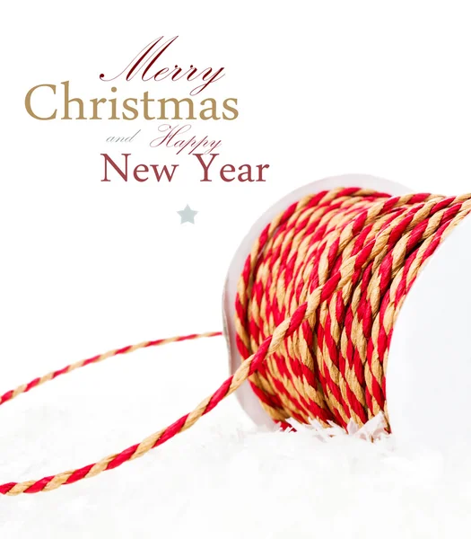 Composición navideña con cinta roja y nieve — Foto de Stock