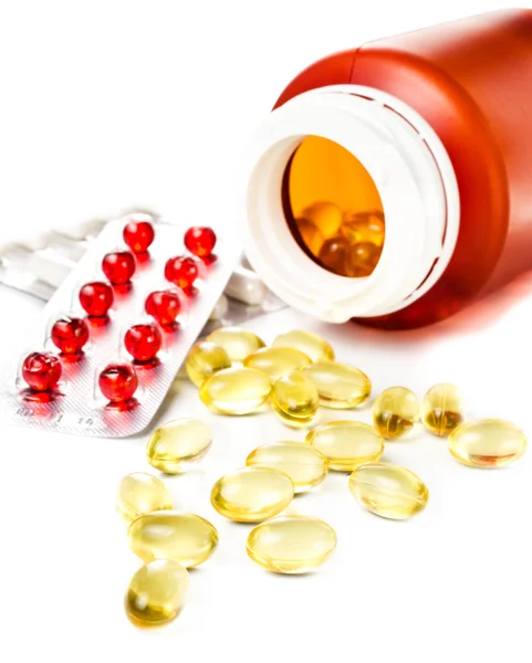 Receptę tabletki wysypują się z butelki pigułki z opakowań typu blister — Zdjęcie stockowe