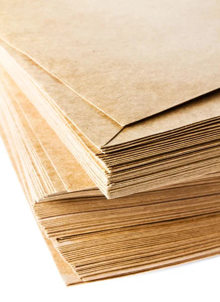 Stack of yellow recycled paper envelopes Stock Photo