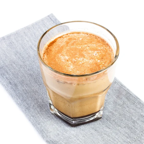 Coffee with milk in a glass cup — Stock Photo, Image
