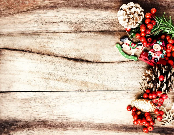 Rustic Christmas decoration on natural wooden board texture — Stock Photo, Image