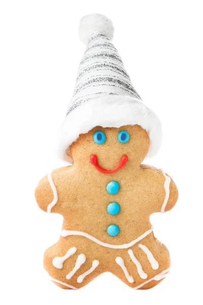 Lebkuchen Mann Weihnachtsgebäck mit Weihnachtsmütze — Stockfoto