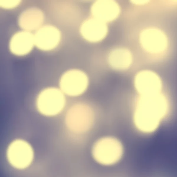 Defocused Bokeh twinkling lights Vintage background. — Stock Photo, Image