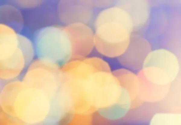 Defocused Bokeh twinkling lights Vintage background. — Stock Photo, Image