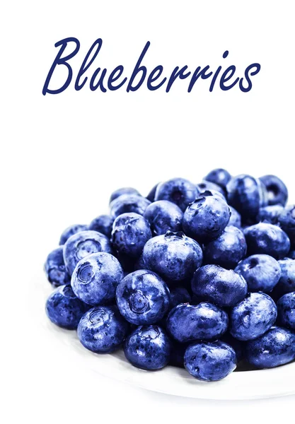 Blueberries on white plate — Stock Photo, Image