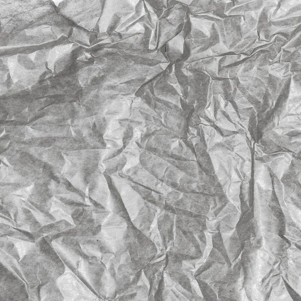 Grijze verfrommeld papier textuur — Stockfoto