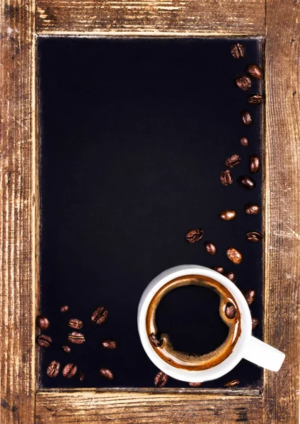Taza de café y pizarra vintage pizarra primer plano — Foto de Stock